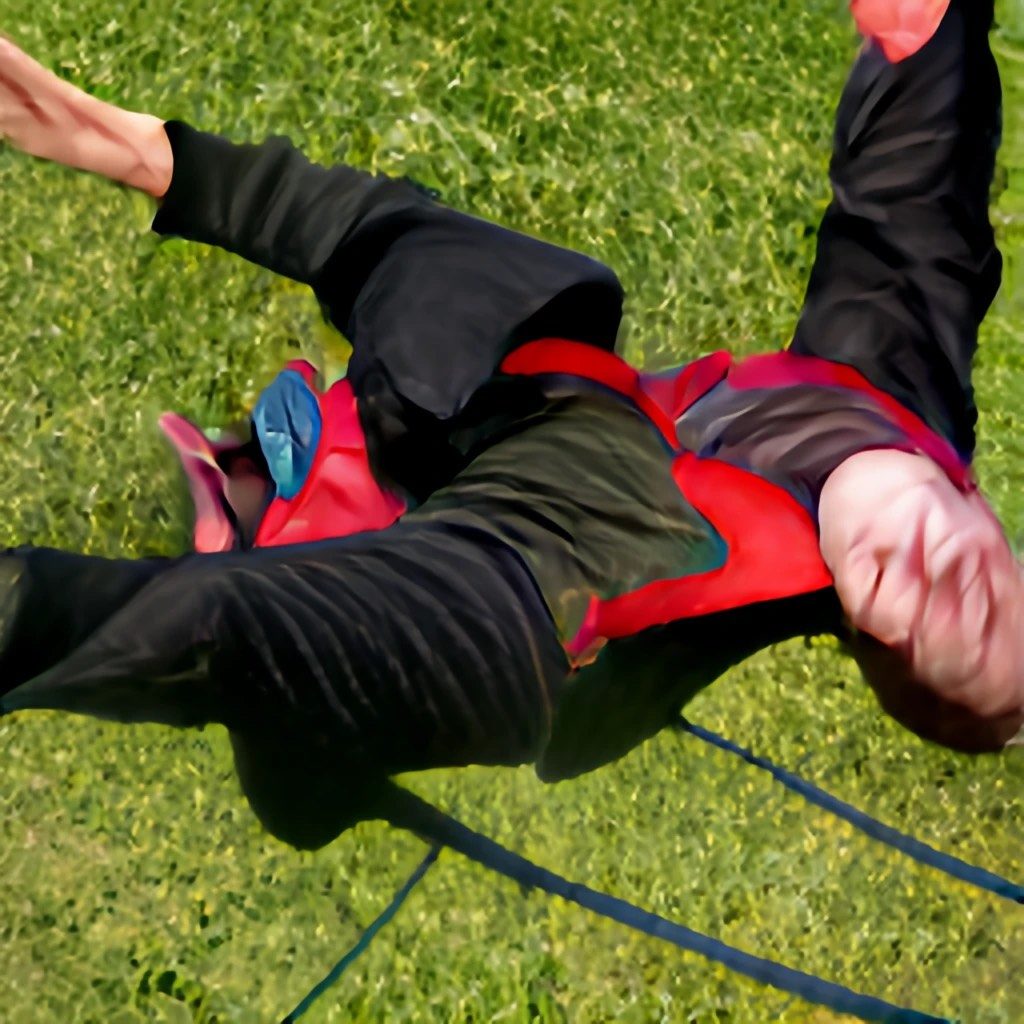 A disturbing AI-generated image of a faceless man, potentially wearning a suit, falling into some grass as seen from above. He seems to have more limbs than one would expect for a human.