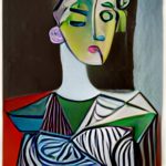 A portrait of a woman, approximating the style of Pablo Picasso.